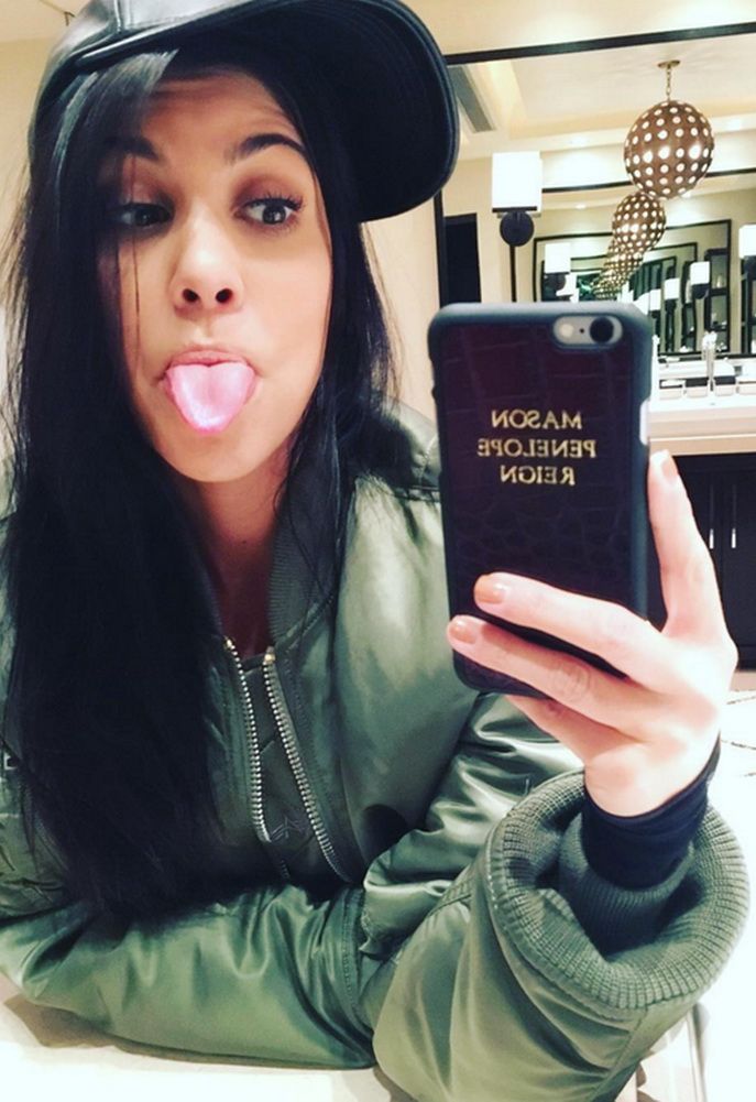 Kourtney Kardashian in Alpha Industries